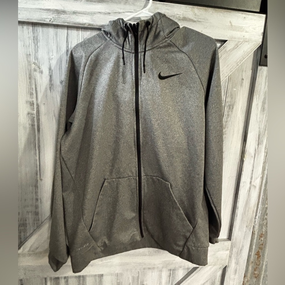 Nike full zip up size L. No rips, tears or stains.